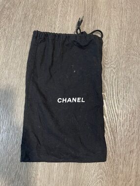 CHANEL Black Drawstring Pouch with White Logo Dust Bag
